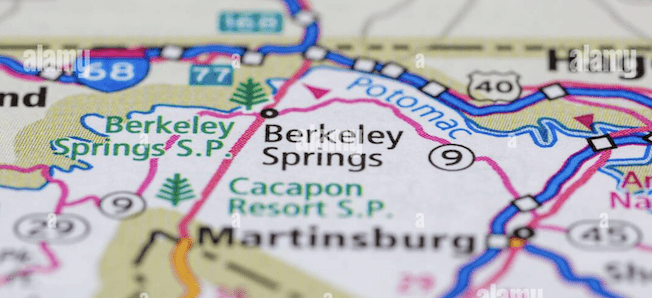 A close-up image of a map highlighting the area around Berkeley Springs in West Virginia. Nearby locations include Berkeley Springs State Park, Cacapon Resort State Park, Martinsburg, and the Potomac River. Various roads and route numbers are also visible.